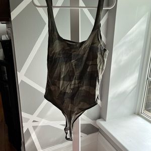 Garage camo bodysuit size small in great condition